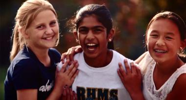 three girls laughing