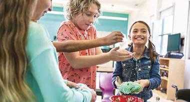 Campers enjoying science experiment